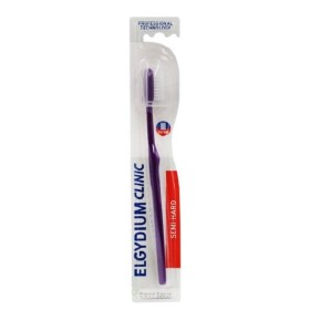 Elgydium Οδοντόβουρτσα Clinic 25/100 Brush Μέτρια - Σκληρή Μωβ 1τεμ